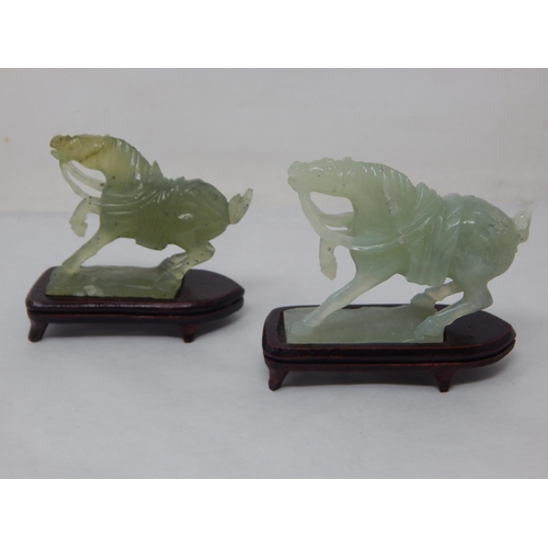 Two Similar Carved Jade/Jadeite Figures of Horses on Wooden Stands 6.8cm wide