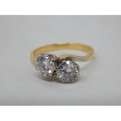 299 - 18ct Yellow Gold Ring, Claw Set with Two Brilliant Cut Diamonds Totalling 1.20cts: Size J: Gross wei... 