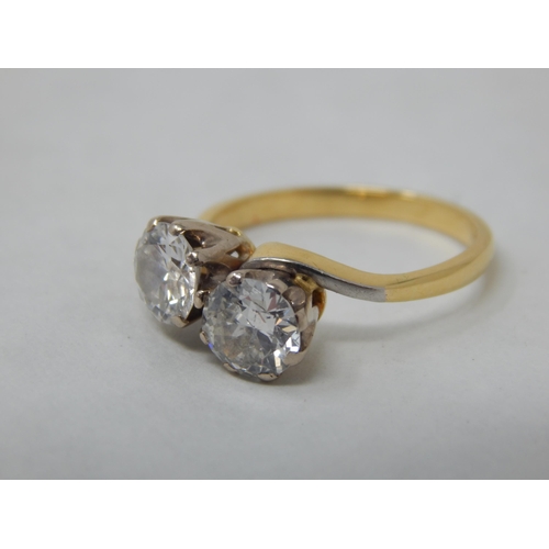 299 - 18ct Yellow Gold Ring, Claw Set with Two Brilliant Cut Diamonds Totalling 1.20cts: Size J: Gross wei... 