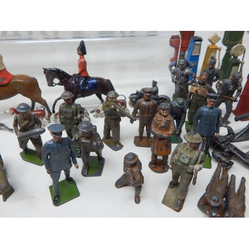 446 - A Large Collection of Lead Soldiers, Figures, Road Signs, Zoo Animals, Farm Animals, Petrol Pumps, A... 