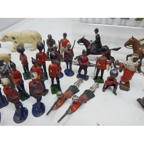 446 - A Large Collection of Lead Soldiers, Figures, Road Signs, Zoo Animals, Farm Animals, Petrol Pumps, A... 