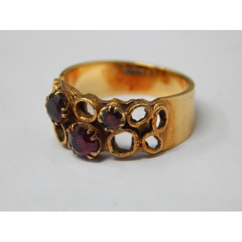 295 - 18ct Yellow Gold Garnet Set Ring: Size M: Weight 5.8g