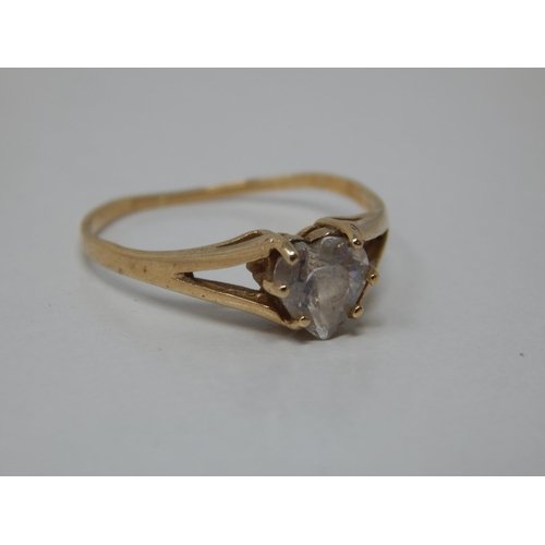 299B - 9ct Gold Ring Set with a Heart Shaped Stone: Gross weight 1.51g