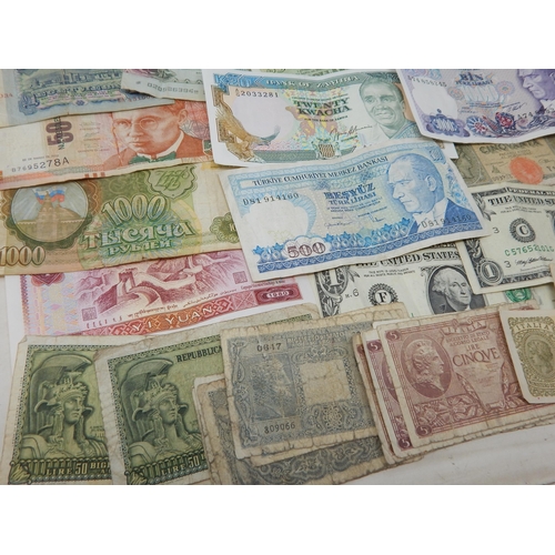 99C - A Quantity of World Banknotes