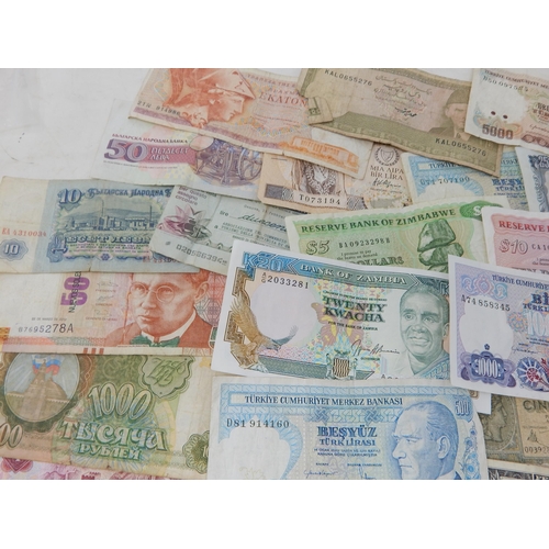 99C - A Quantity of World Banknotes