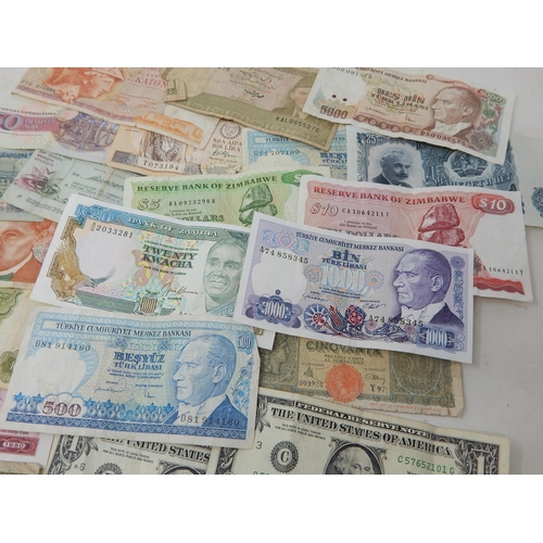 99C - A Quantity of World Banknotes