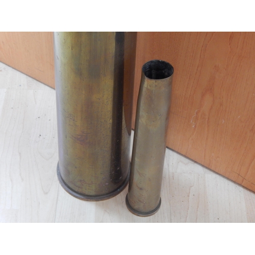 479C - WWII Brass Gun Shell dated 1940, Height 64cm together with a smaller brass shell