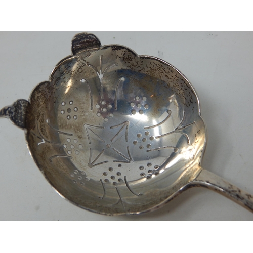 104 - Silver Tea Strainer Hallmarked Sheffield 1947 by Emile Viner: Length 14cm