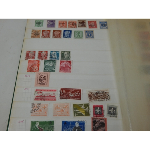 95 - A Well Put Together Finschreiben Stack Book containing a large quantity of East German stamps: Sorti... 