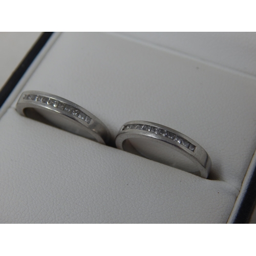 129 - A Pair of Matching 950 Platinum Rings Each Chanel Set with 11 Diamonds: Ring Sizes L/N: Gross weight... 