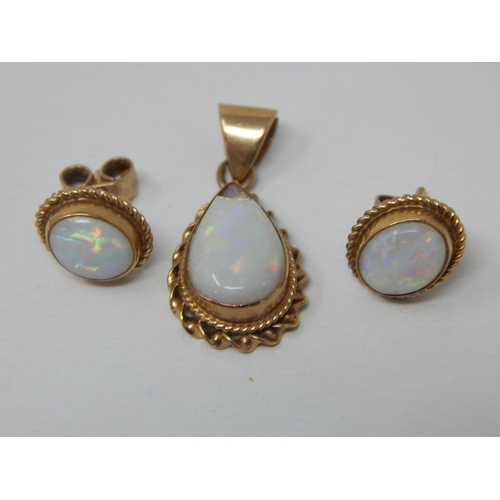 134 - 9ct Yellow Gold Opal Pendant together with a pair of matching 9ct Gold Opal Earrings: Gross weight 3... 