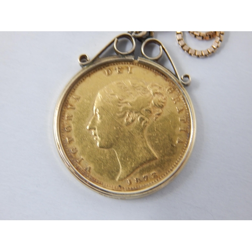 141 - QV 1873 Shield Back Half Sovereign in 9ct Gold Mount on 9ct Gold Chain: Gross weight 8.3g