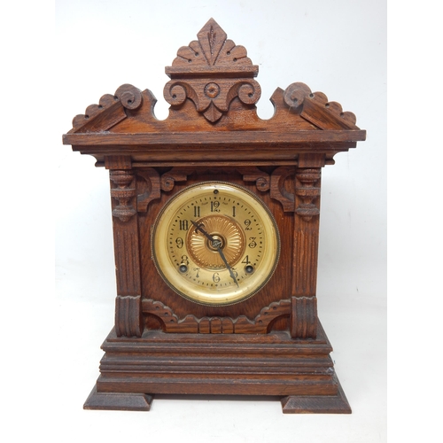 Early 20th Century Wooden Cased Ansonia, New York Pendulum/Striking Clock with Key: Height 37cm