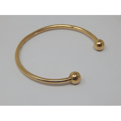 170 - 9ct Yellow Gold Torque Bangle: Weight 11.75g