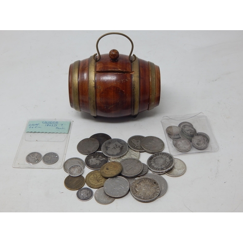 2 x QV Silver Fourpences 1843, one overstruck 3 over 2 (unrecorded?) together with a small quantity of silver threepences, various silver & miscellaneous coins contained in a vintage wooden barrel shaped money box with screw off end.