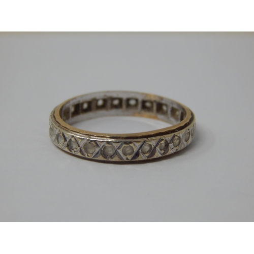 189 - 9ct Gold Eternity Ring: Size N: Weight 2.69g (one stone vacant)