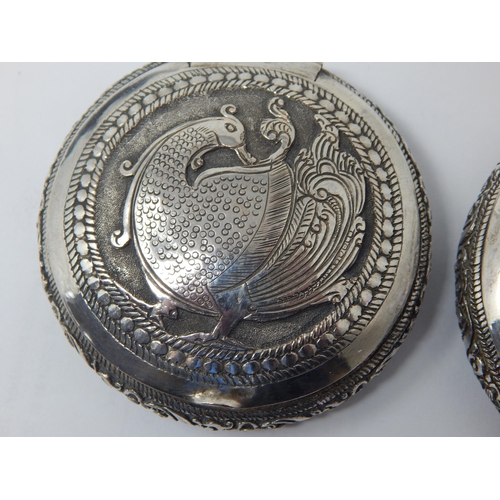 195 - Two Indian Silver Tobacco Boxes with Hinged Lids Depicting Animals: 6.4cm diameter: Weight 120g