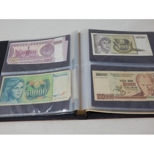 99S - An Album Containing a Quantity of World Banknotes