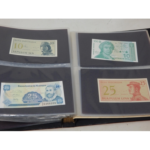 99S - An Album Containing a Quantity of World Banknotes