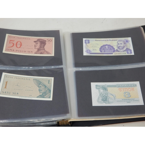 99S - An Album Containing a Quantity of World Banknotes