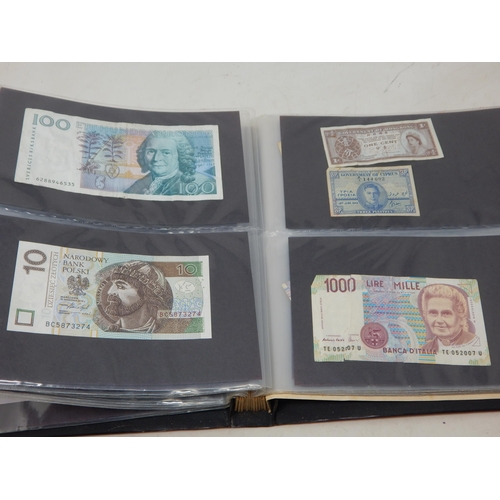 99S - An Album Containing a Quantity of World Banknotes