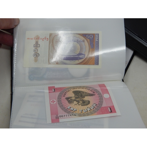 99T - 4 x Albums Containing a Quantity of World Banknotes