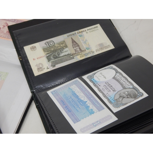 99T - 4 x Albums Containing a Quantity of World Banknotes