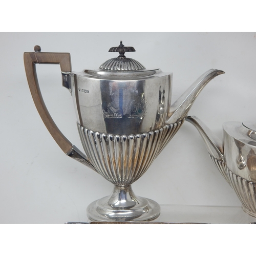 100A - Hallmarked Silver Matched Four Piece Tea & Coffee Service Comprising: Tea Pot, Coffee Pot, Twin Hand... 