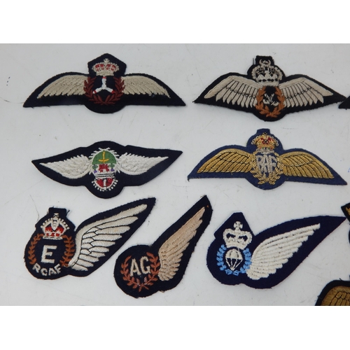 461 - A Quantity of RAF & RAAF Insignia Including: WWII Air Gunners: Wireless Operator: Officers Beret Bad... 