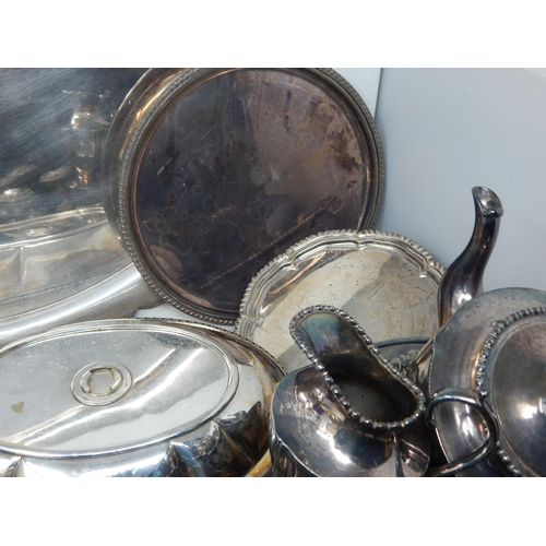 127 - A Large Quantity of Silver Plated Wares Including Tray, Coasters, Pots, Basket, Candlesticks, Condim... 