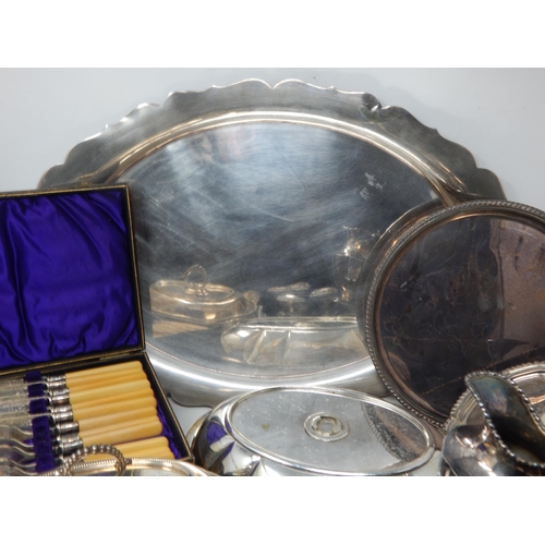 127 - A Large Quantity of Silver Plated Wares Including Tray, Coasters, Pots, Basket, Candlesticks, Condim... 