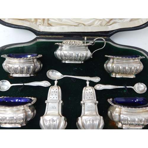 144 - Late Victorian 12 Piece Silver Cruet Set with Cobalt Blue Glass Liners: Hallmarked Birmingham 1900 b... 