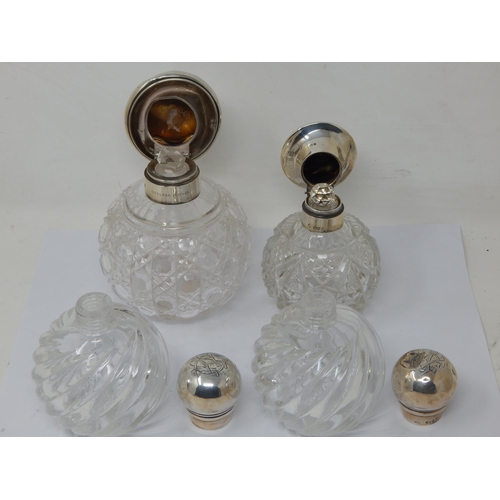 131N - A pair of Victorian Silver Mounted Perfume Bottles together with a Silver, Tortoiseshell & Pique Inl... 