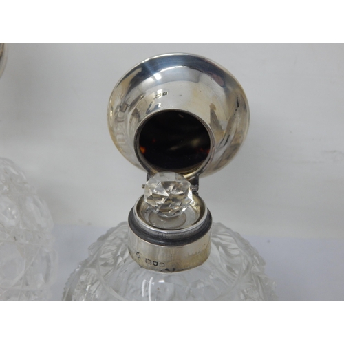 131N - A pair of Victorian Silver Mounted Perfume Bottles together with a Silver, Tortoiseshell & Pique Inl... 