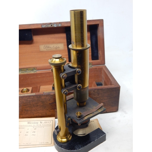 395 - Late 19th century E. Leitz Microscope with Lenses in Fitted Mahogany Case with Retailers Label: 