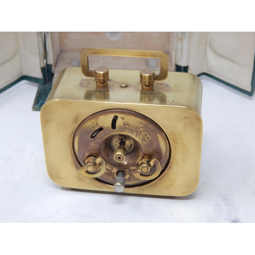 375 - Art Deco French Brass Cased Travelling Alarm Clock in Original Fitted Travel Case: Working when cata... 