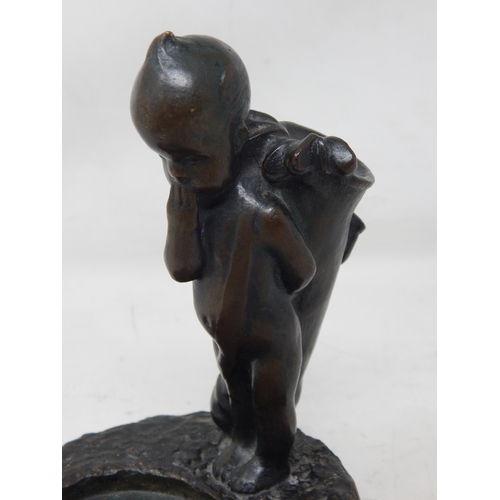 377 - 1930's Bronze Figure of a Small Boy Carrying a Golf bag & Clubs looking at the distant golf ball: Si... 