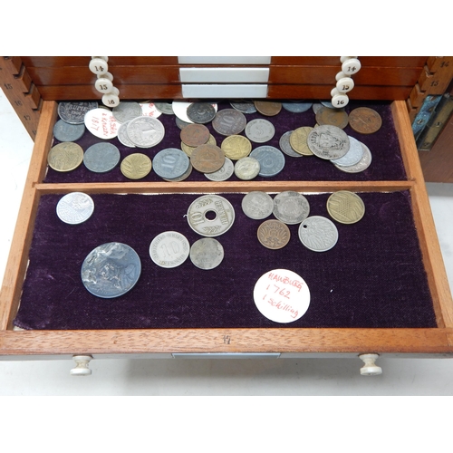 49J - An Oak 20 Drawer Coin/Specimen Cabinet Containing a Large Assortment of Coinage, Medallions etc: Mea... 