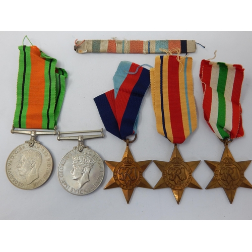 WWII Medals Including 1939-1945 Star, Italy Star. The Africa Star, Victory Medal & Defence Medal