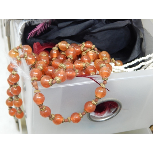 115 - A large Quantity of Vintage Costume Jewellery Including Necklaces etc (lot)