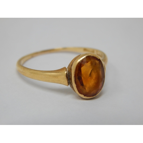 102 - 18ct Gold Ring Set with a Citrine: Size Q: Gross weight 2.48g