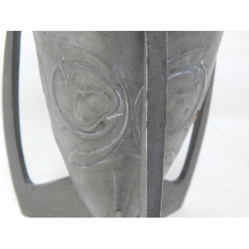 300 - Archibald Knox for Liberty & Co - An Art Nouveau Tudric pewter 'Rocket' vase, with raised and stylis... 