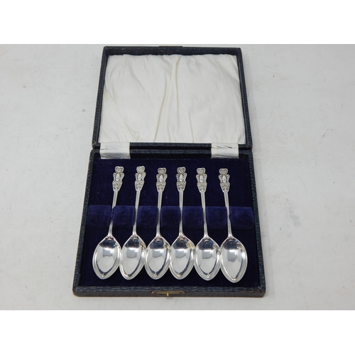 132 - A Set of 6 Art Nouveau Silver Tea Spoons with Stylised Foliate Terminals: Hallmarked Birmingham 1911... 