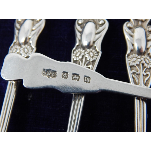 132 - A Set of 6 Art Nouveau Silver Tea Spoons with Stylised Foliate Terminals: Hallmarked Birmingham 1911... 