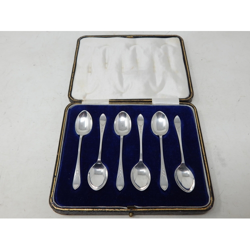 136 - A Set of 6 Silver Coffee Spoons: The terminals with blank cartouches: Hallmarked Sheffield 1926 by J... 