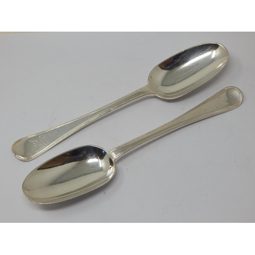 137 - A Pair of Victorian Silver Rat Tail Tablespoons: Hallmarked London 1870 by George Adams: Length 20cm... 