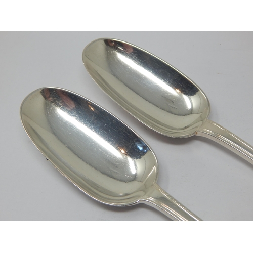 137 - A Pair of Victorian Silver Rat Tail Tablespoons: Hallmarked London 1870 by George Adams: Length 20cm... 