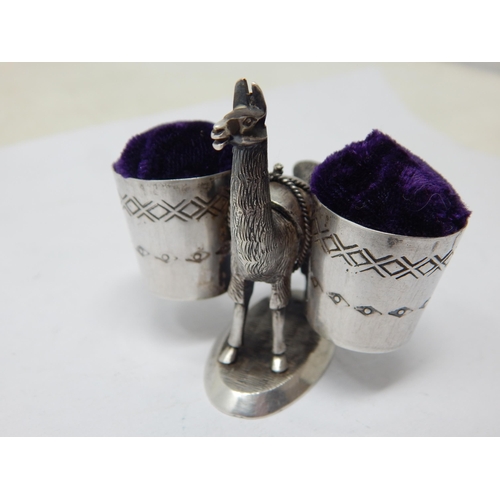 142 - Sterling Silver Double Pin Cushion formed as a Llama carrying two baskets.