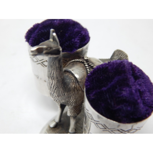 142 - Sterling Silver Double Pin Cushion formed as a Llama carrying two baskets.