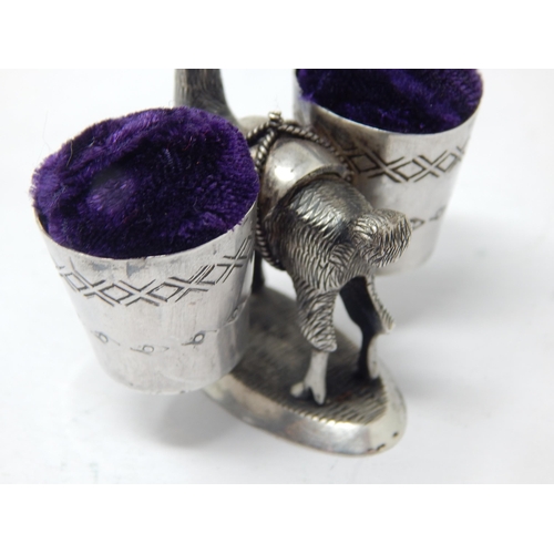 142 - Sterling Silver Double Pin Cushion formed as a Llama carrying two baskets.